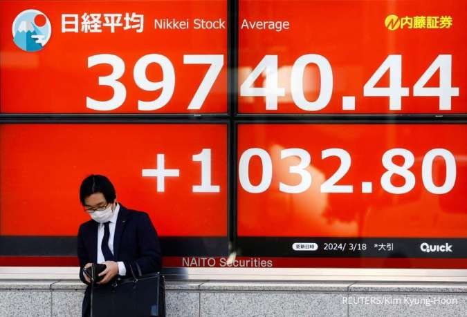 Bursa Asia Turun Setelah Nada Dovish Powell; Inflasi Jepang dan China dalam Fokus